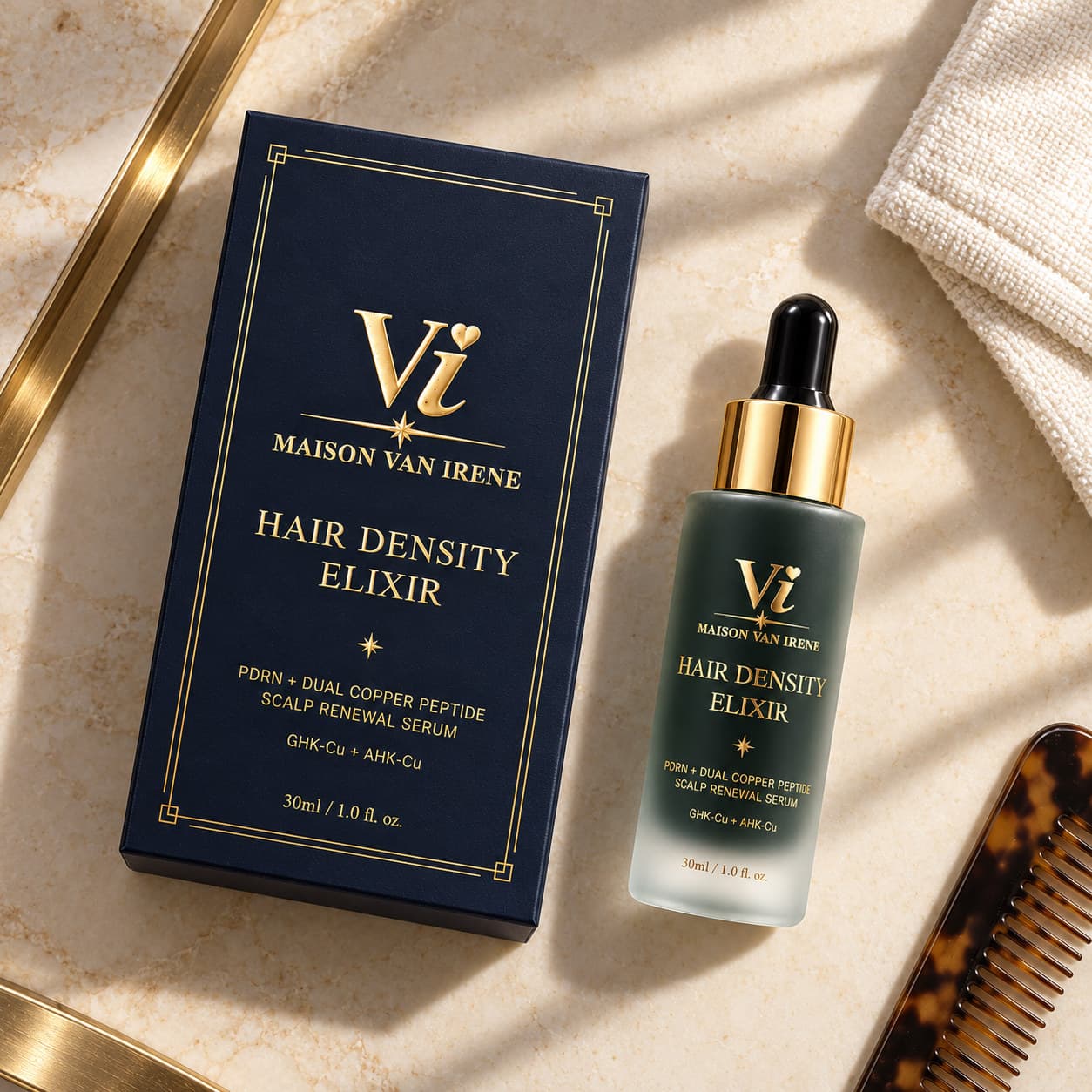 Hair Density Elixir luxury scalp serum — carton and bottle laid flat on marble with a tortoiseshell comb