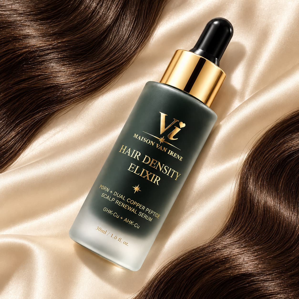 Hair Density Elixir hair density serum lying on champagne silk between waves of glossy dark hair — PDRN, GHK-Cu and AHK-Cu